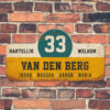 Van-den-Berg-naambord-koenmeloen-geel-wit-blauw-zwart-muur rallybord