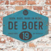 Naambord-de-boer-blauw-zwart-ruit-koenmeloen-vintage-muur