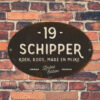 Naambord-Schipper-vintage-koenmeloen-voordeur-antraciet-wit-muur