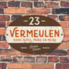 Naambord-Vermeulen-vintage-koenmeloen-voordeur-oranje-bruin-wit-muur