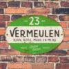 Naambord-Vermeulen-vintage-koenmeloen-voordeur-groen-zwart-wit-muur